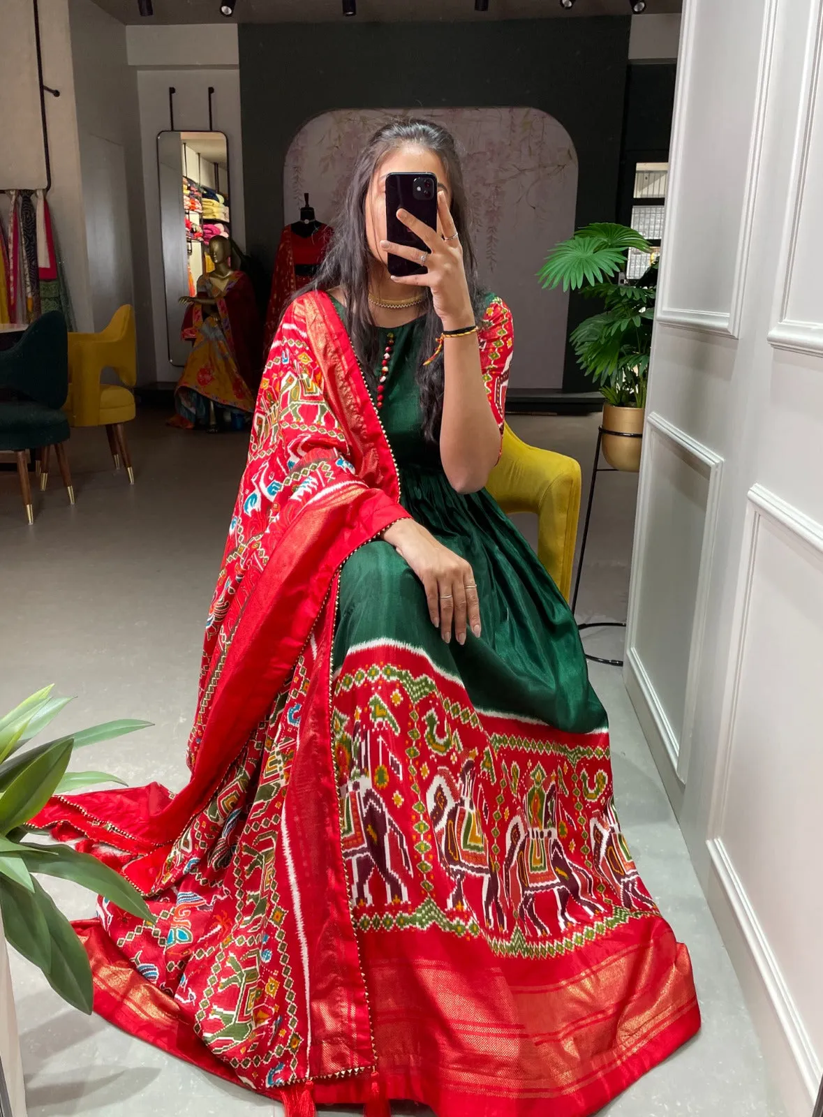 Green Color Patola And Foil Printed Dola Silk Gown
